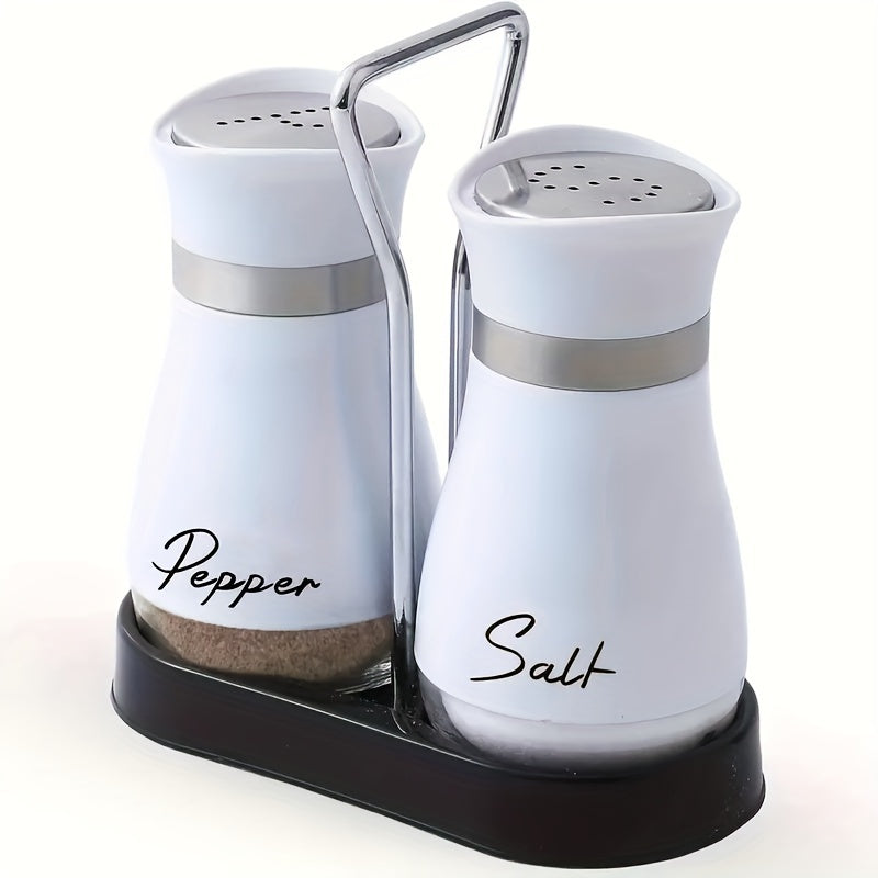 Stainless steel and leather salt and pepper shaker set with stand, perfect for kitchen gadgets and as a housewarming or Christmas gift.