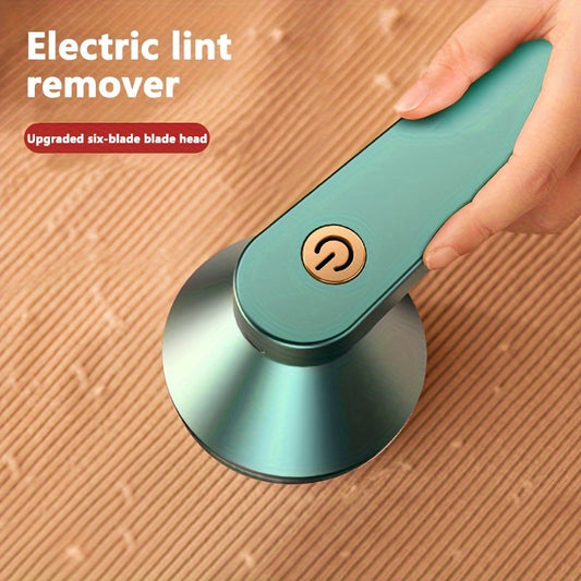 Portable fabric shaver with USB rechargeable battery. Perfect for removing lint and fuzz from clothes and bedding.