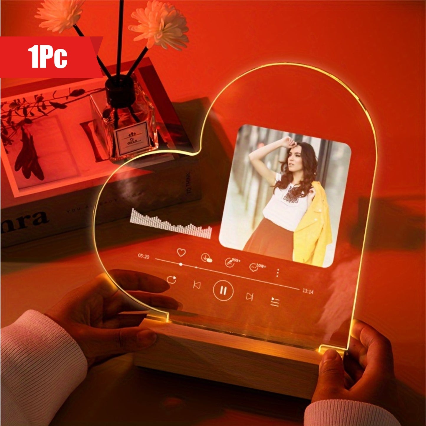 Acrylic photo frame in the shape of a luminous heart, customized with your own photos. This creative display frame makes for a personalized and memorable keepsake.