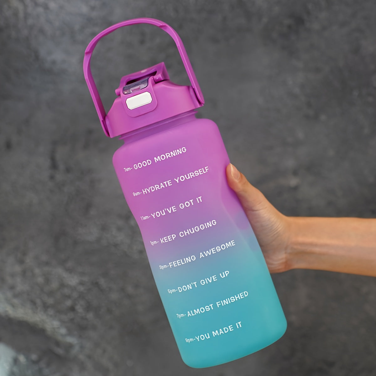 68oz gradient water bottle with motivational time markers, leak proof straw, ideal for running and sports, hand wash only, PVC free, great holiday gift option.