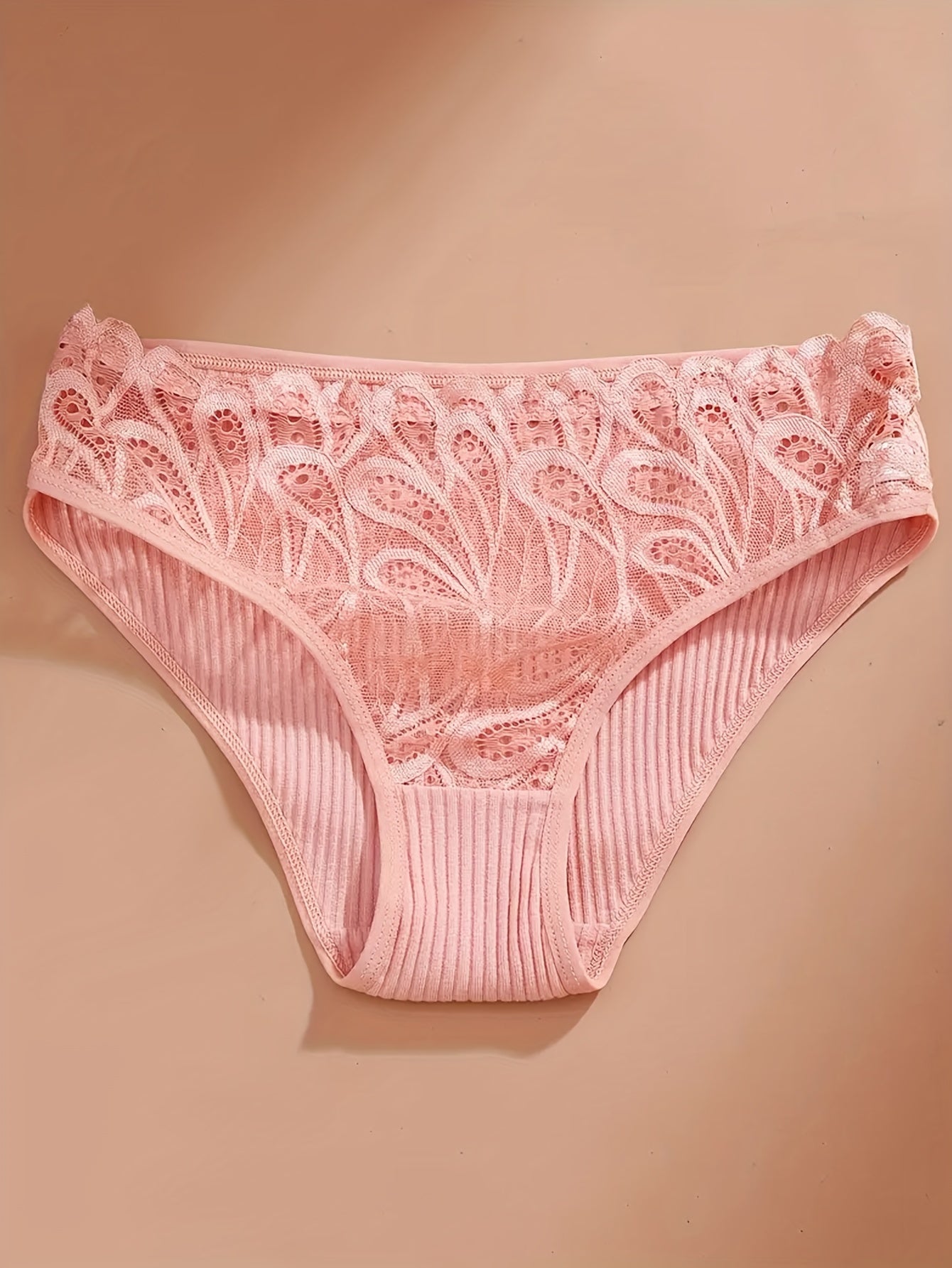 4-pack of lace trim briefs for women, made of comfortable breathable cotton.