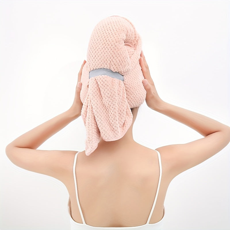 Fast-drying microfiber hair towel for women with long, thick, and curly hair. Soft coral fleece material with elastic band for everyday comfort. Beige textured design for quick drying.