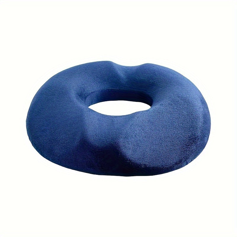 Memory foam seat cushion for office chairs, cars, and yoga. Circular cutout design with blue oval shape. Hand washable polyester fabric for comfort and support. Contoured cushion with