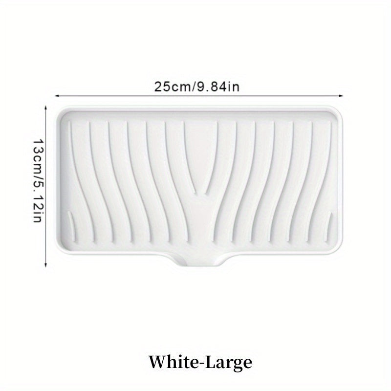 Silicone soap dish with self-draining design for countertop or sink storage in bathroom.