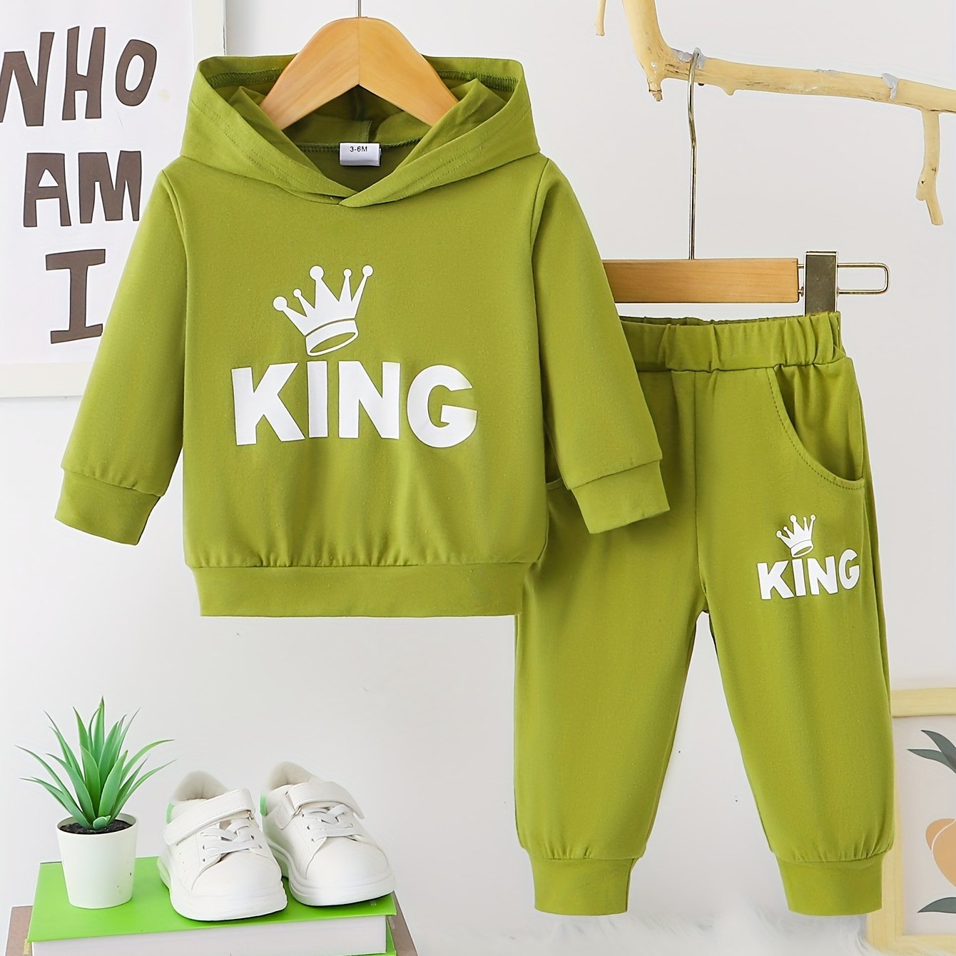 Baby boy's casual outfit set with hooded sweatshirt featuring KING print and matching pants.