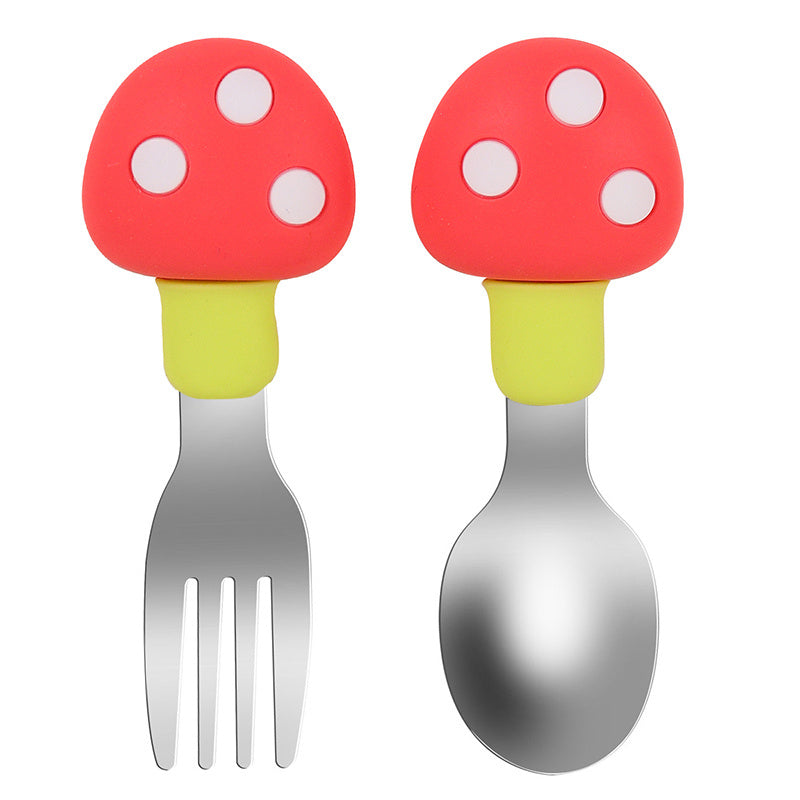 Set of feeding utensils for babies made of silicone and featuring a mushroom design. Includes a spoon and fork.