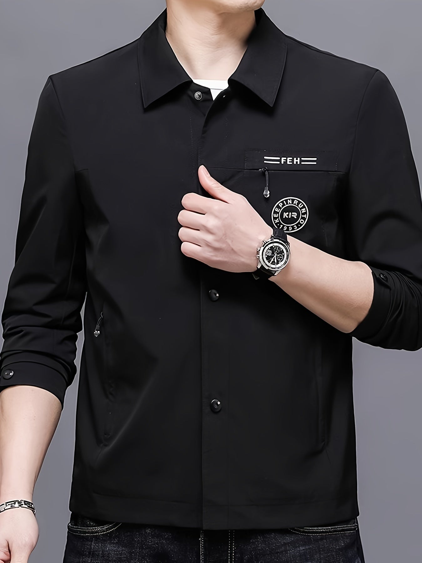 Men's stylish black button-up jacket featuring a "FEM" patch, perfect for casual and formal events in fall and spring. Made of polyester, single-breasted, and long-sleeved.