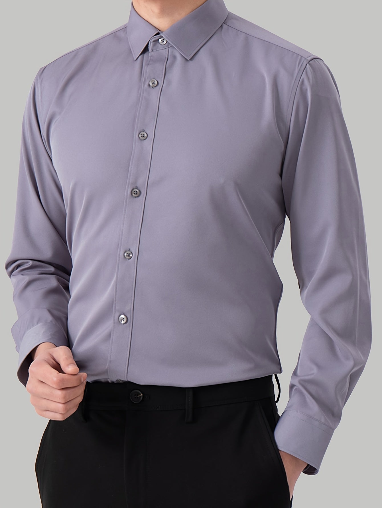 2 Men's work style polyester dress shirts in solid colors, regular fit with button details and lapel collar.