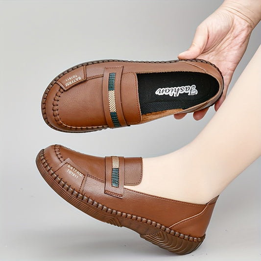 Women's comfortable round toe flat slip-on shoes for walking outdoors.