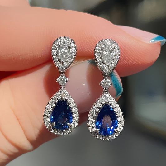 Exquisite and premium jewelry designed for women, showcasing a stunning water drop-shaped silvery earring adorned with shimmering zirconia stones. This elegant piece weighs around 3.9 grams and is ideal for special occasions and evening gatherings. A