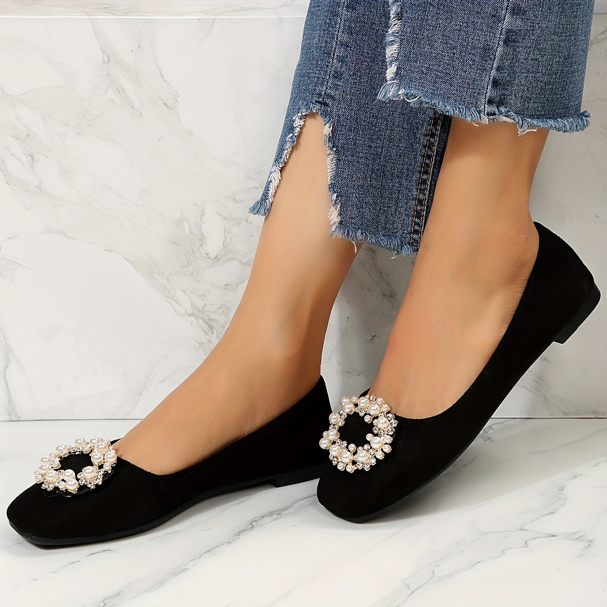 Women's black flat shoes with embellishments and comfortable fabric upper. Suitable for casual or formal occasions. Versatile and durable rubber sole.