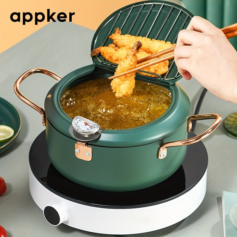 Japanese tempura fryer for easy frying, featuring a Fahrenheit thermometer and non-stick carbon steel construction. Ideal for tempura, chicken, fish, and shrimp. This large green pan is easy to clean and comes with a lid and oil drip drain rack. Perfect