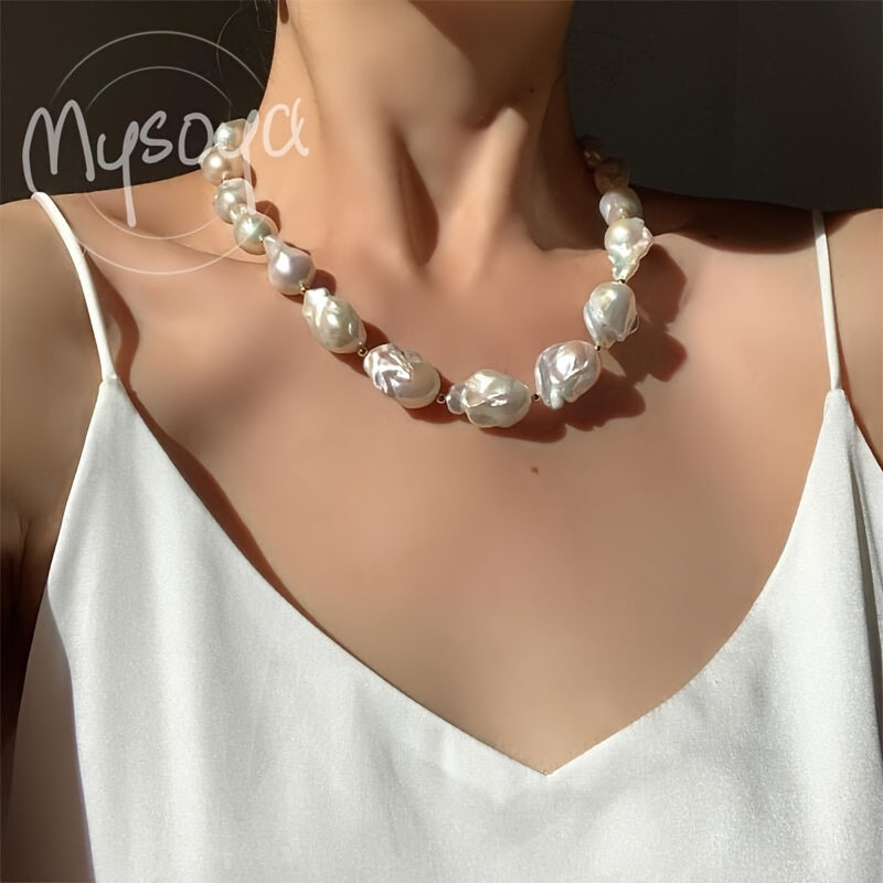 This elegant and unique baroque freshwater pearl necklace from MYSOYA Brand is the perfect accessory for any occasion. With pearls ranging from 14-23mm in size, this handmade boho necklace is a stunning choice for a party, wedding, anniversary, or as a