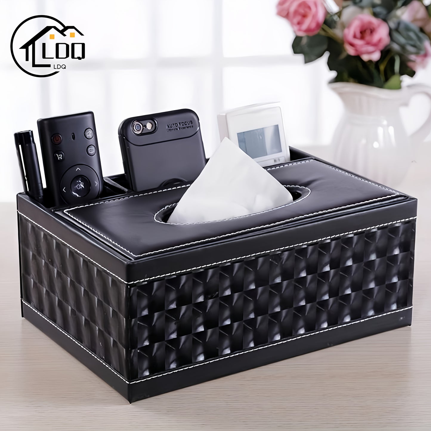 Versatile faux leather tissue and storage box with four compartments, ideal for coffee table and living room. Includes remote control holder and napkin organizer, perfect for home