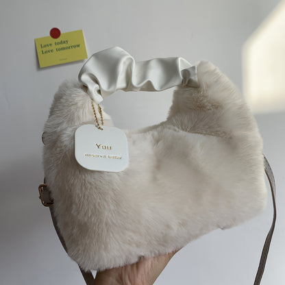 Stylish plush crossbody bag for women in faux fur with adjustable strap and zip closure. Perfect for fall/winter in khaki, light grey, dark khaki, cream, or pink.