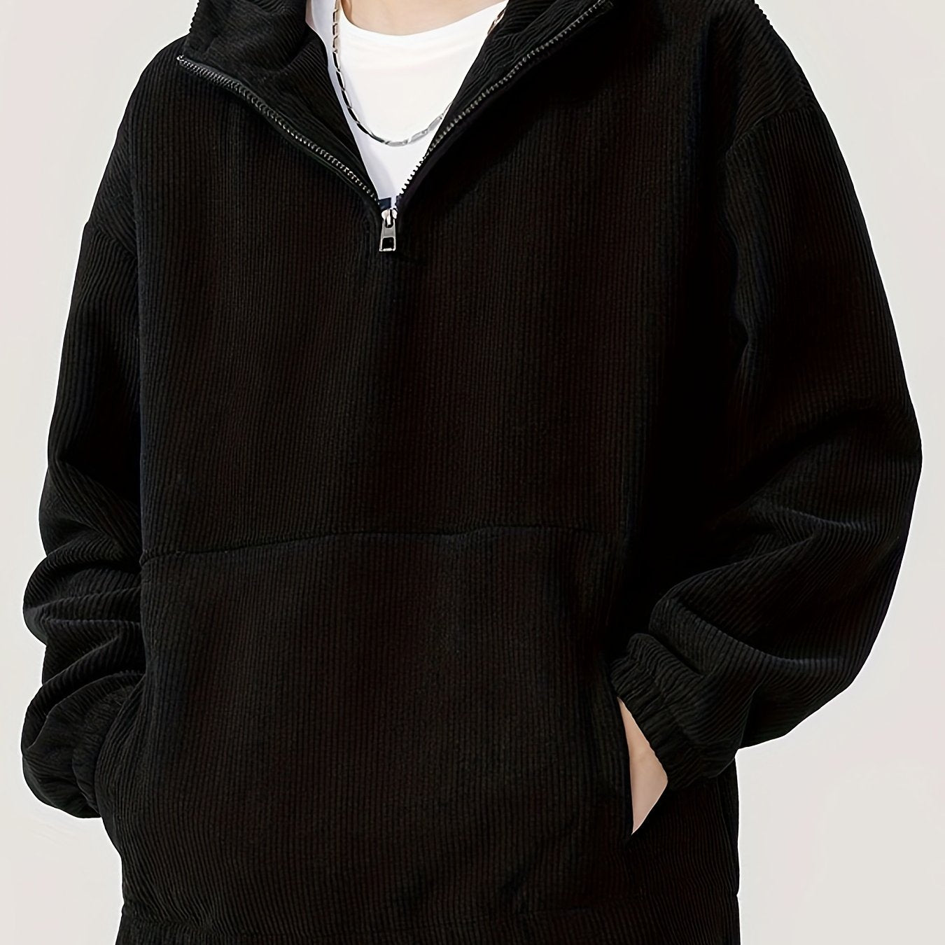 Men's cozy knit zip-up hoodie with dropped shoulder sleeves for casual wear.