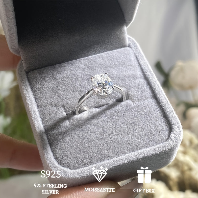 A hypoallergenic wedding or engagement ring gift for women, featuring a 2 carat goose egg Moissanite stone set in a classic four-prong 925 Sterling Silver ring. Includes Moissanite certificate and comes in an exquisite gift box.