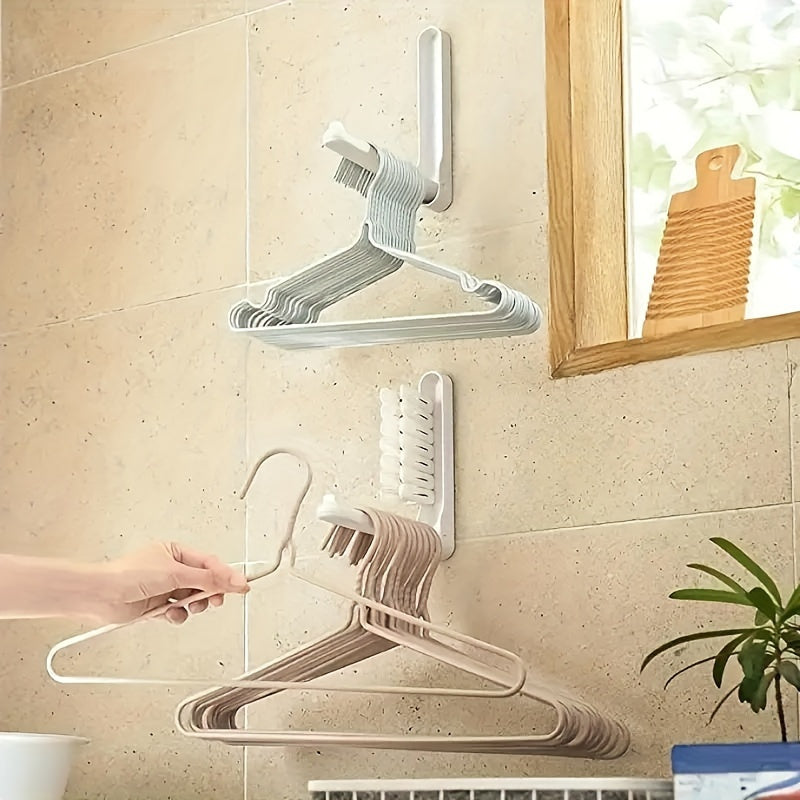 Foldable wall hanger with hooks, perfect for saving space. Made of durable plastic, this organizer is ideal for holding clothes and towels. Versatile storage rack suitable for both indoor and outdoor use. Easy to install on the wall, with a casual style