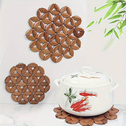 Bamboo pot mat protects dining table from high temperatures.