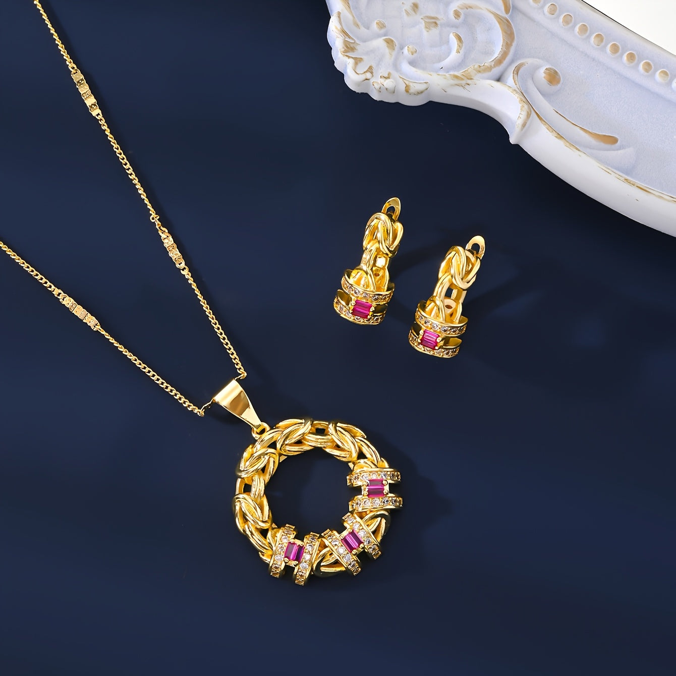 Luxurious Dubai-inspired jewelry set crafted with simple brass material and 18k Gold Plating, adorned with Zirconia stones. This elegant 5-piece set includes a necklace, earrings, bracelet, and ring, perfect for daily wear or as a special gift. The Retro