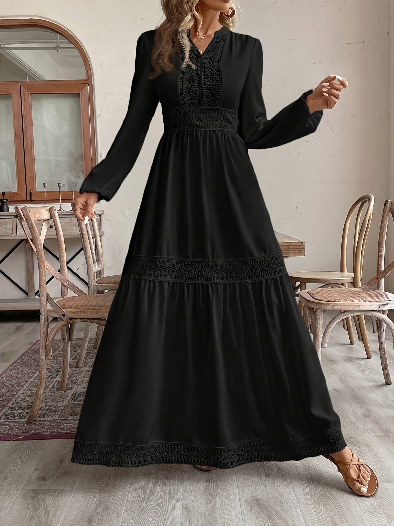 Stylish black maxi dress for women with lace detailing, high waist, and long sleeves. Made of polyester, suitable for all seasons. Flowy silhouette and non-transparent material.