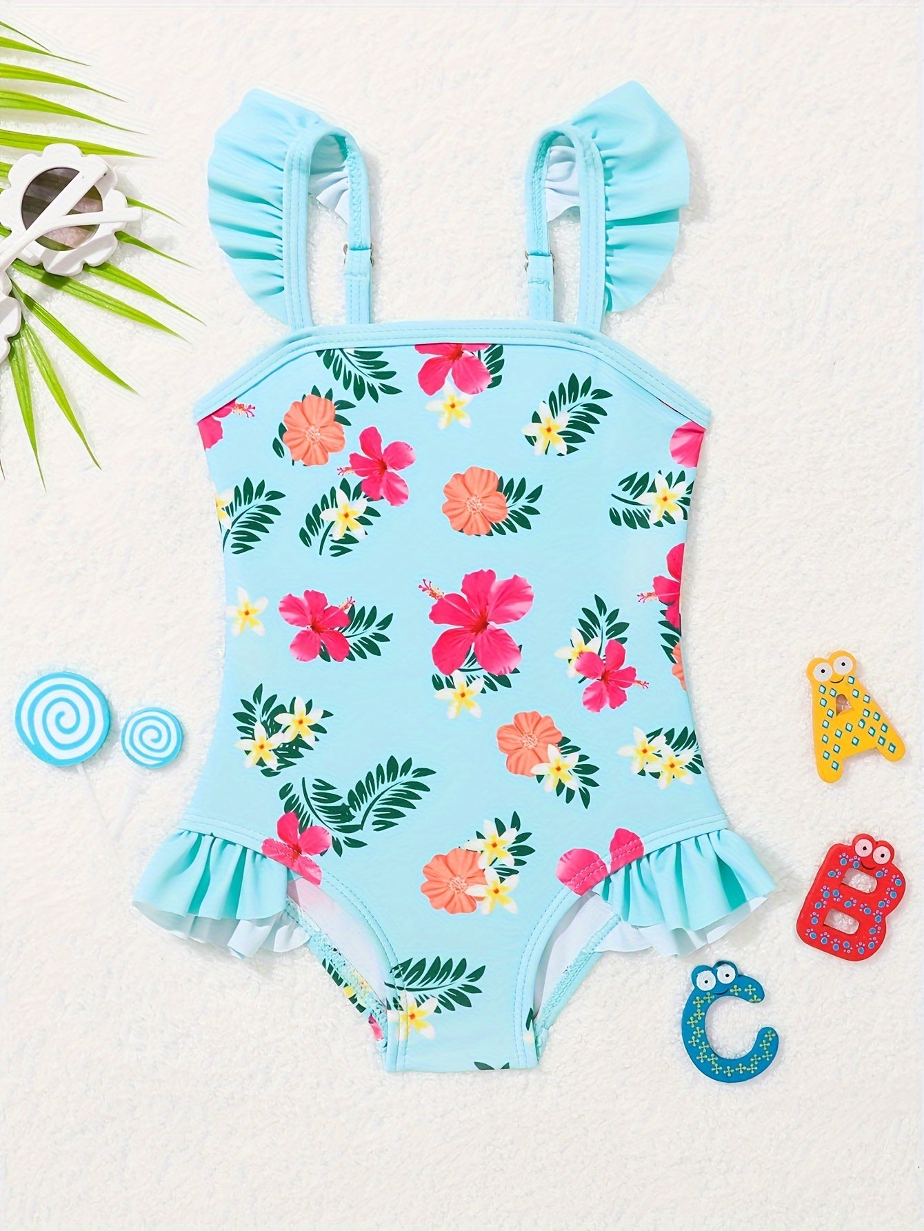 Adorable pineapple pattern one-piece girls' swimsuit in quick-dry, stretchy polyester with ruffle detail, off-shoulder design for toddlers.