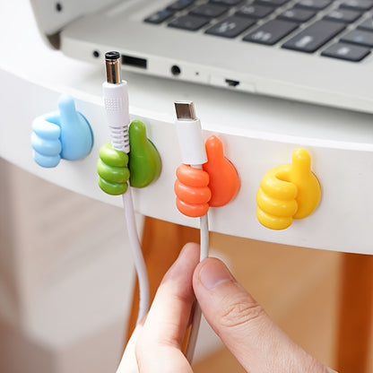 Set of 10-50 Plastic Wall Mounted Cable Storage Racks with Thumb-shaped Hooks for Earphones, Chargers, Keys; ideal for organizing desktops, offices, bedrooms.