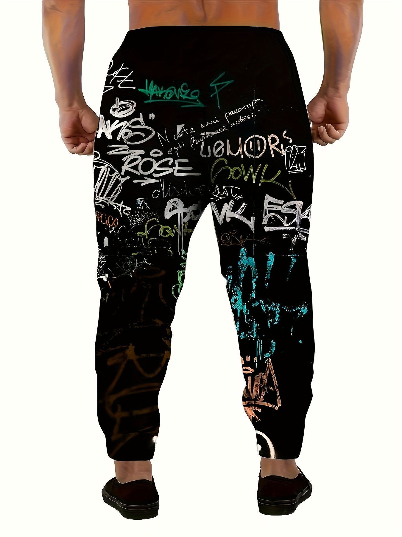 Men's polyester sweatpants with 3D graffiti print, drawstring, pockets, slight stretch, regular fit joggers.