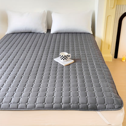 Waterproof mattress topper with machine washable quilted polyester cover, polyurethane liner, and non-slip design for dormitory and home use. 1-piece.