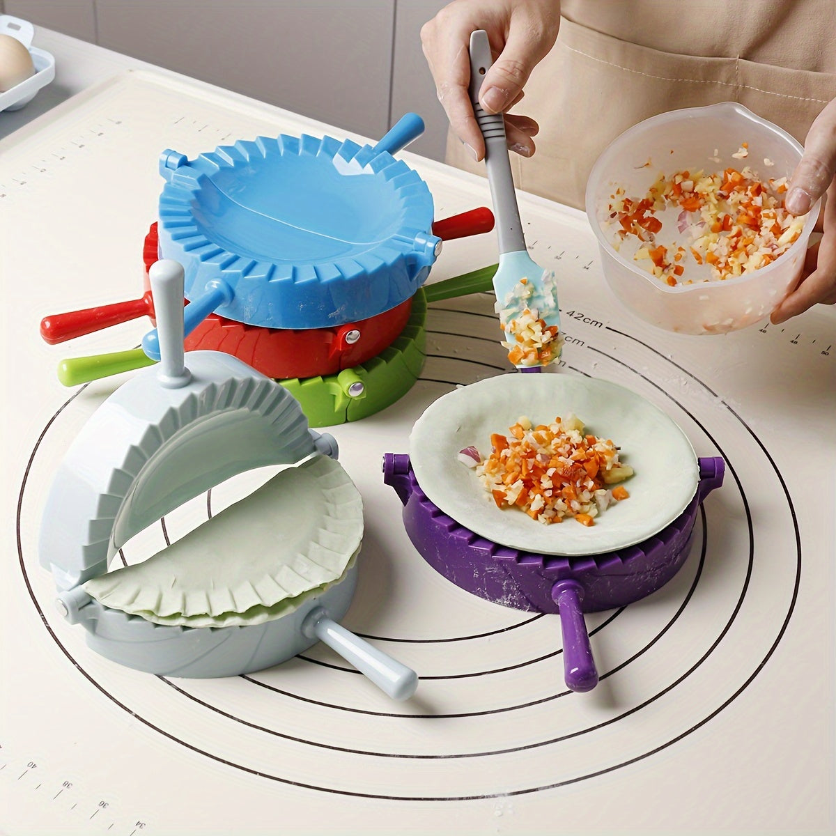 One piece of a plastic dumpling maker, also known as a dumpling mold or manual dumpling wrapper. This versatile kitchen gadget can also be used as an empanada maker and comes with kitchen accessories.