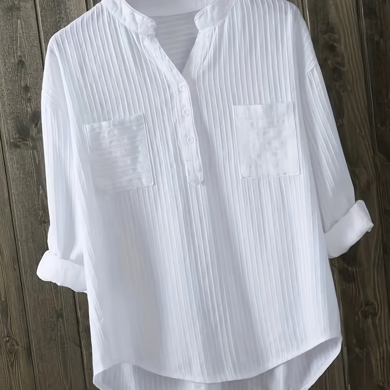 Machine washable women's white linen blend shirt with long sleeves, v-neck, and button detail.