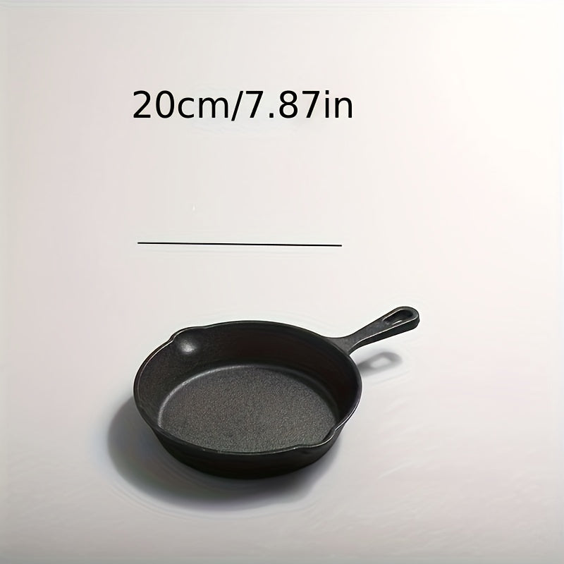 Three-piece seasoned cast iron pan measuring 16, 20, and 25cm in size. This durable cookware features easy tipping sides and auxiliary handles, making it perfect for both indoor and outdoor cooking.