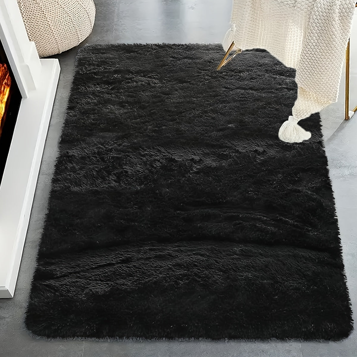 One piece of a shaggy rug, a fluffy floor mat, a simple plush area rug, a round soft area rug mat, a comfortable household carpet, perfect for your living room.