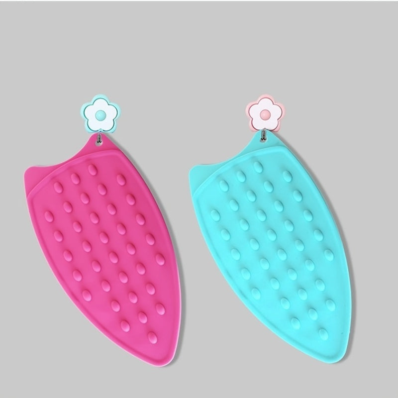 Get 2 premium silicone ironing mats, each measuring 26.67cm thick. These foldable, solid color pads are heat-resistant and feature a textured surface for safe and easy ironing. A must-have for home laundry essentials.