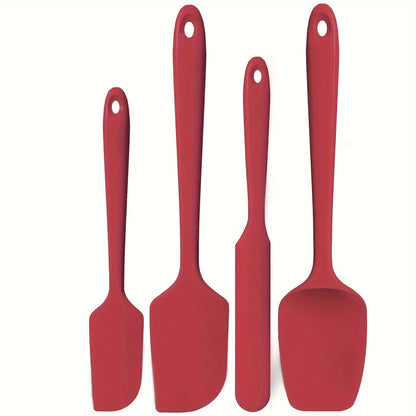 4-piece set of U-Taste heat resistant silicone spatulas for nonstick cookware, with a high temperature resistance of 600ºF and seamless, BPA-free design for safe food handling.