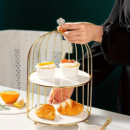 Golden cast iron birdcage cake stand for elegant dessert display in living room, perfect for snacks, fruit, and sweets.