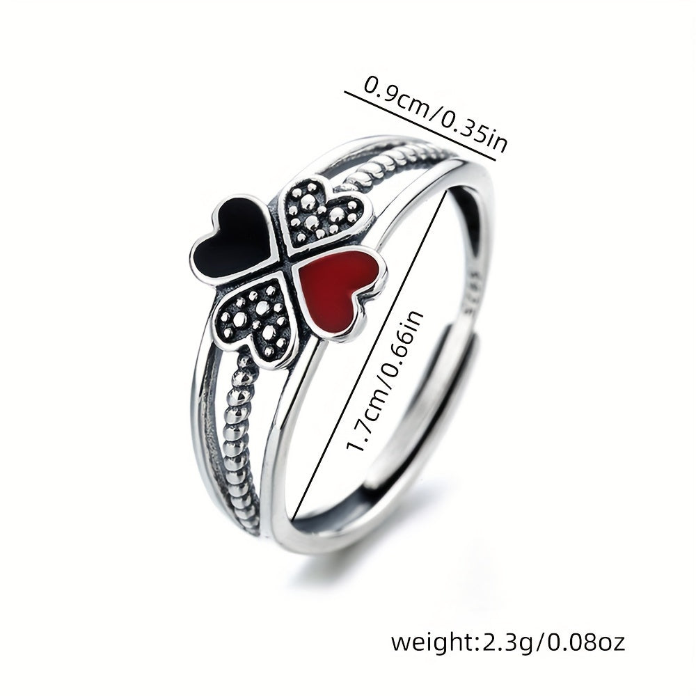 A chic and adaptable sterling silver ring for women featuring a modern enamel heart-shaped four-leaf clover design, perfect for adding flair to your travel and event outfits. Weighing approximately 2.3g, this ring is both practical and fashionable.