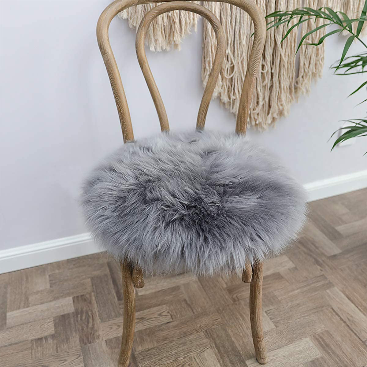 Soft and fluffy grey faux fur area rug and chair pad set. Perfect for adding a cozy touch to your living room. This set includes a small 12-inch round cover for seat cushions and carpet mats.