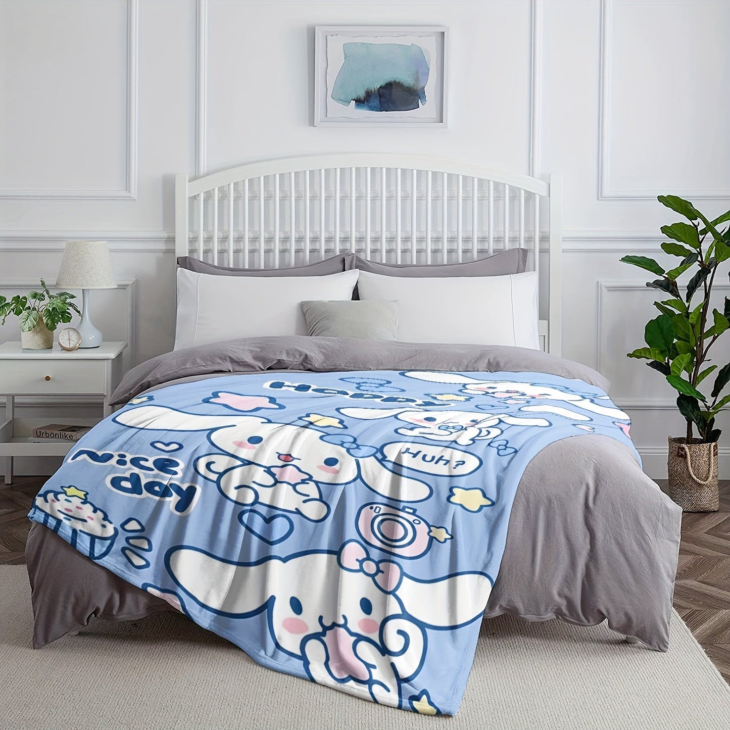 Soft and warm Sanrio Cinnamoroll plush flannel throw blanket featuring a cozy cartoon print. Perfect for adding a touch of cuteness to your bedroom, living room, or for taking on camping trips and travel adventures. This multi-purpose gift is sure to