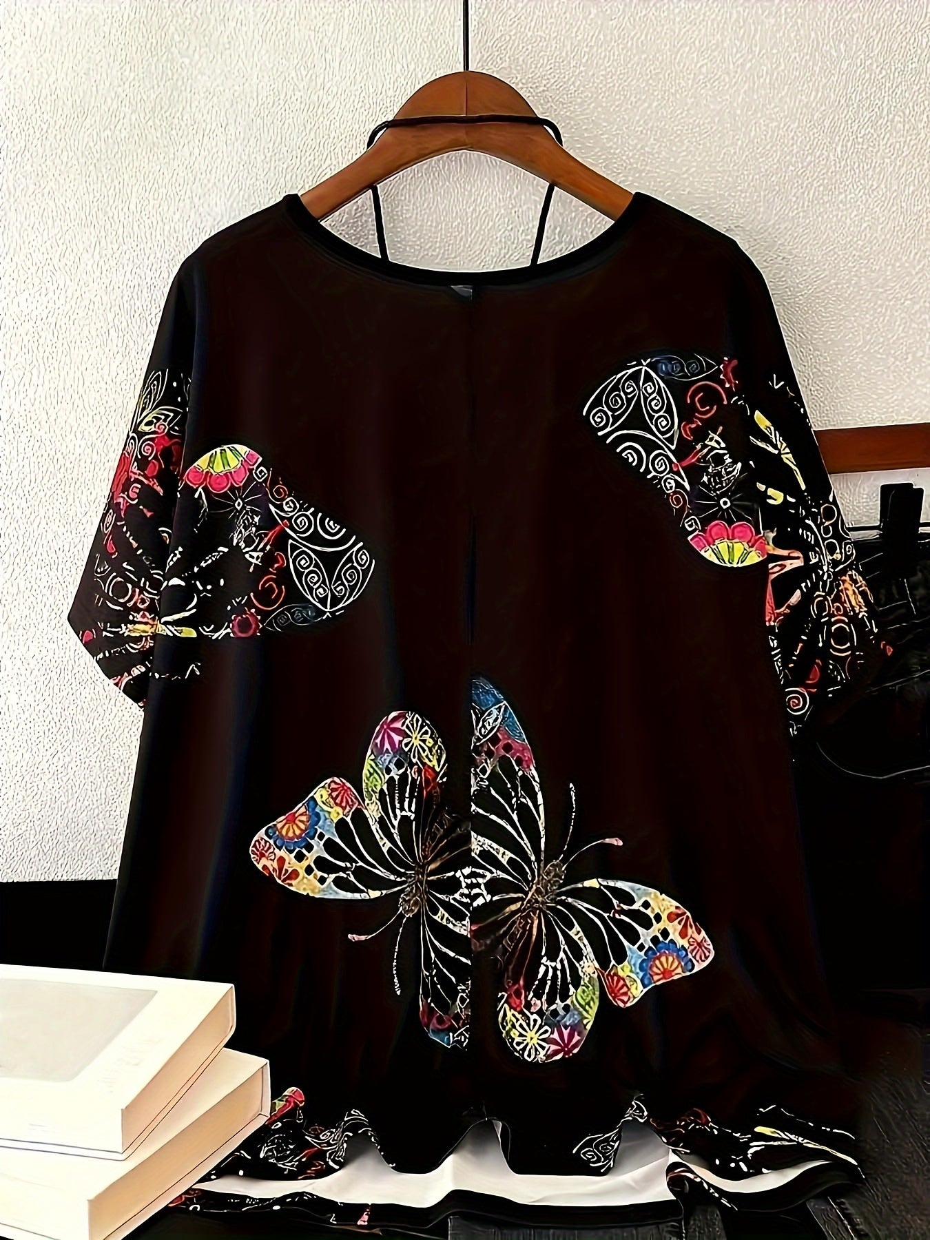 Butterfly print T-shirt for plus size women, crew neck style.