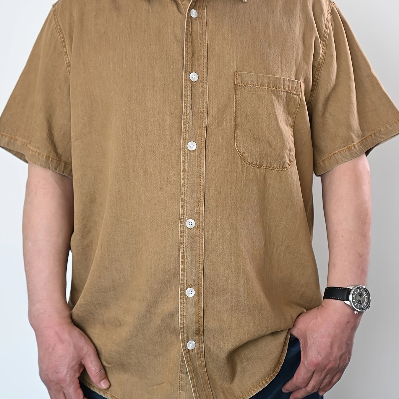 Summer-ready plus size men's denim shirt with vintage flair, V-neck, and button detail. Cotton and lyocell blend, machine washable. Plus size.