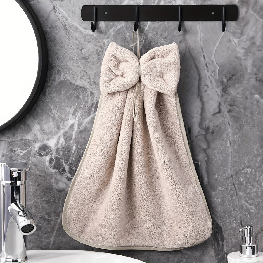 3-piece kitchen towel set with bowknot skirt pattern. Absorbent and quick-drying for household cleaning. Ideal kitchen essentials.