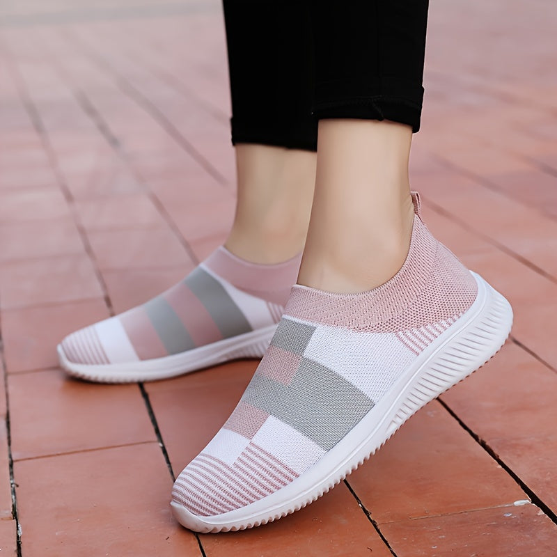 Breathable mesh slip-on sneakers for plus size women in pink, gray, and white plaid with soft sole and round toe design, suitable for all seasons.