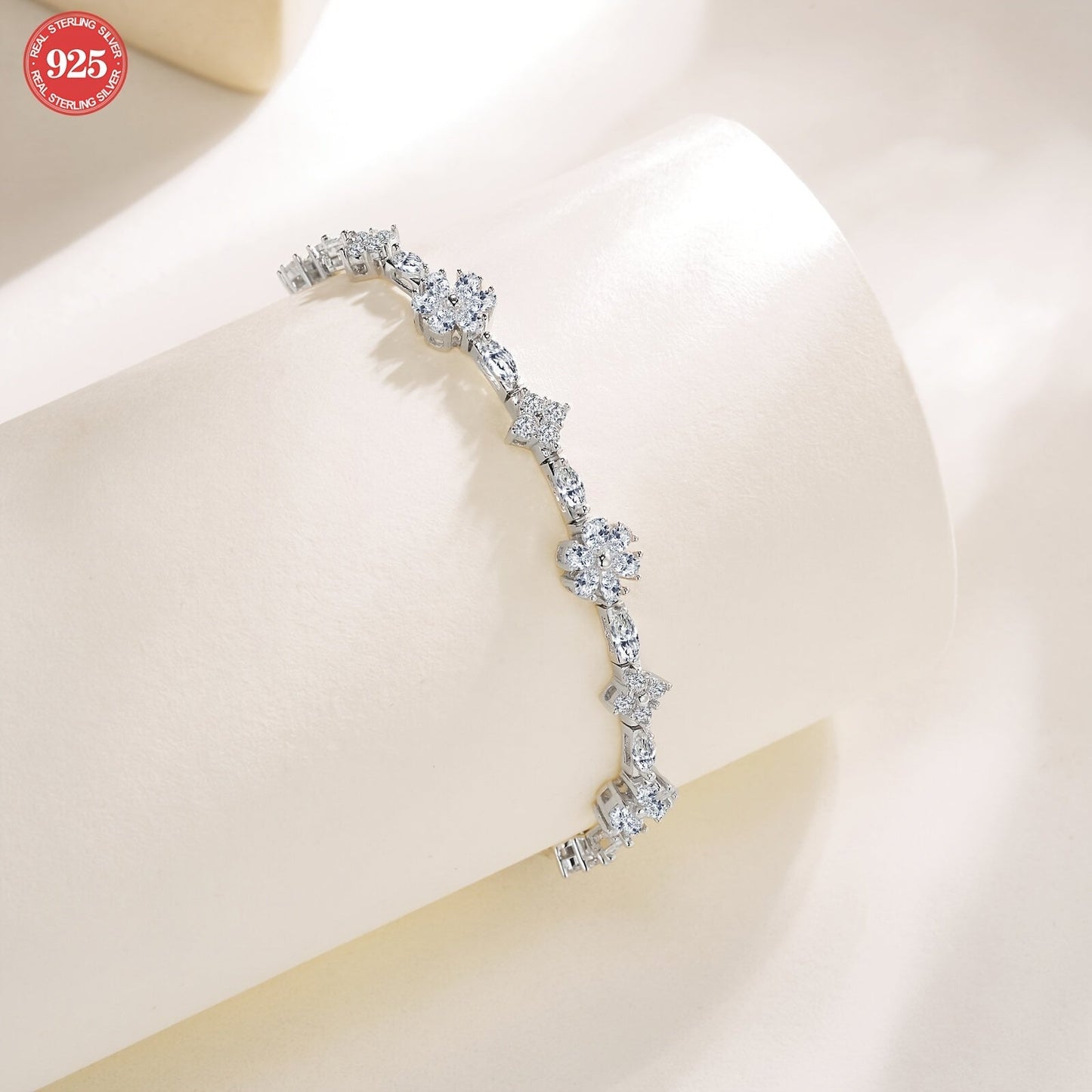 One elegant Onedia bracelet crafted from 925 sterling silver with sparkling synthetic moissanite stones. This stunning piece is adorned with a white golden plating and features the October birthstone. Perfect for gifting, parties, and special occasions