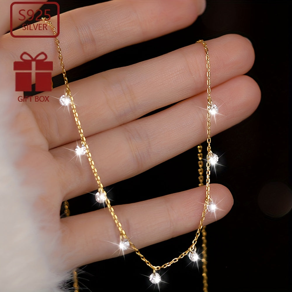 This elegant collarbone chain designed for women is crafted from 925 silver with stunning zirconia inlays. It shines beautifully and is perfect for both travel and everyday wear. Lightweight and low allergy, weighing approximately 1.7g.