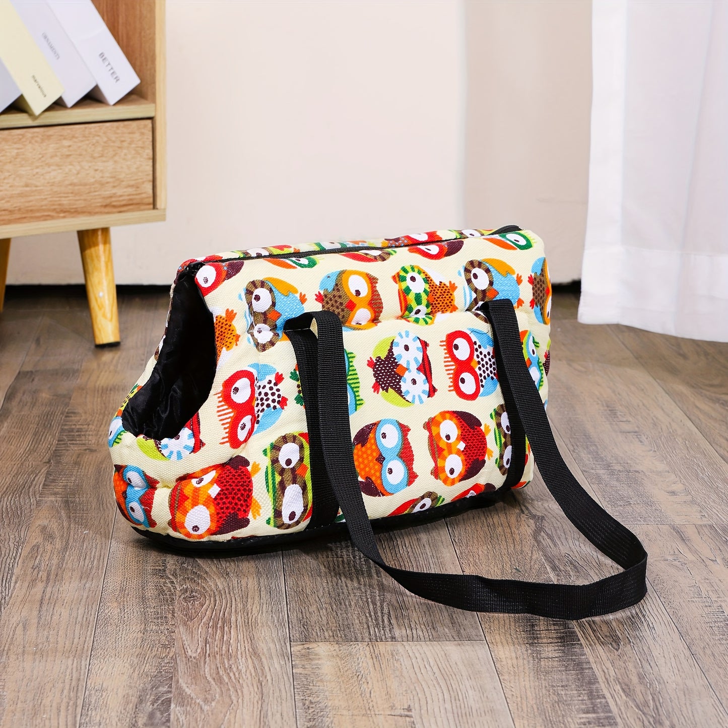 Washable, portable cat carrier bag in multi-colored design, perfect for small to medium cats. Features zippered closure and disassembled for easy litter outings.