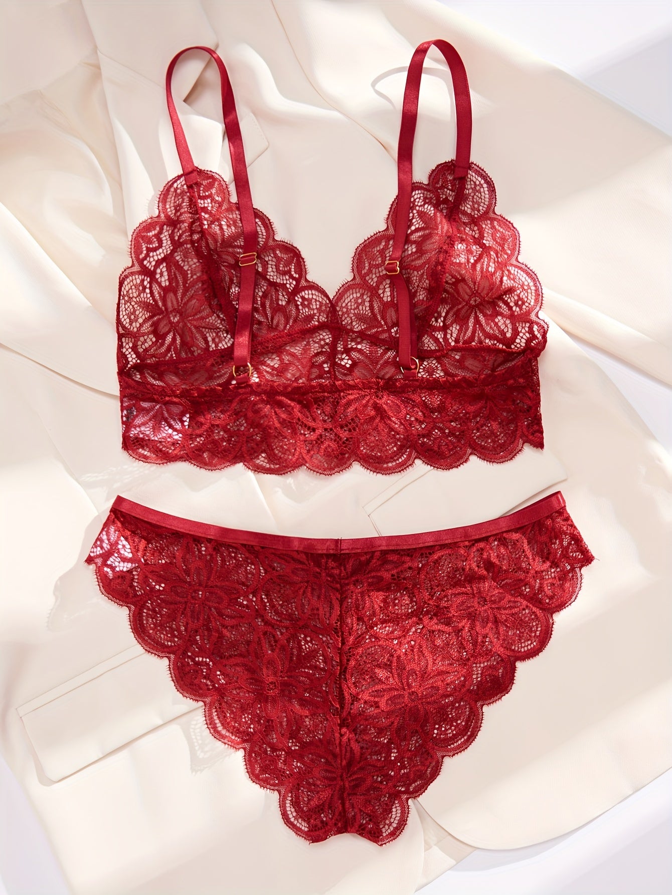 Women's sexy floral lace lingerie set with scallop trim bra and cut out panties.