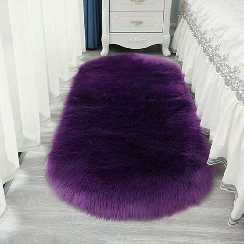 One piece of solid fuzzy oval rug, a contemporary floor carpet perfect for bedrooms.