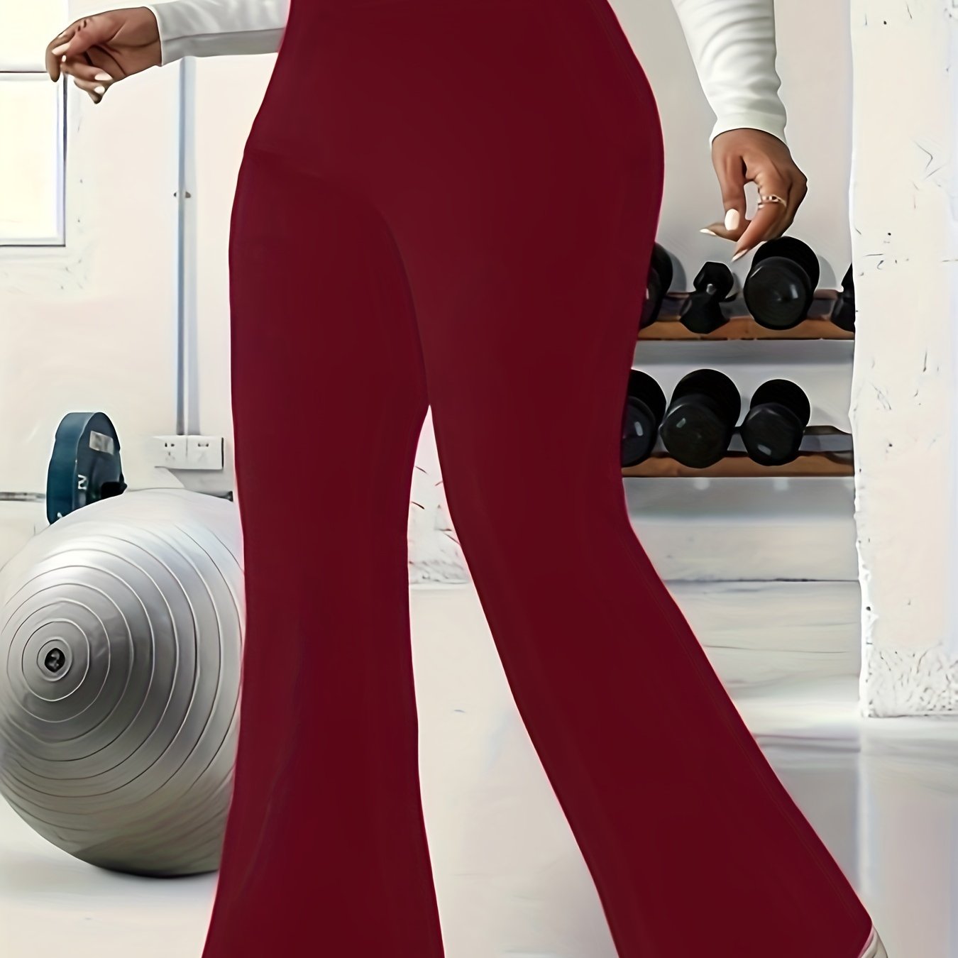 Solid flare leg pants for plus size women, suitable for spring and summer.