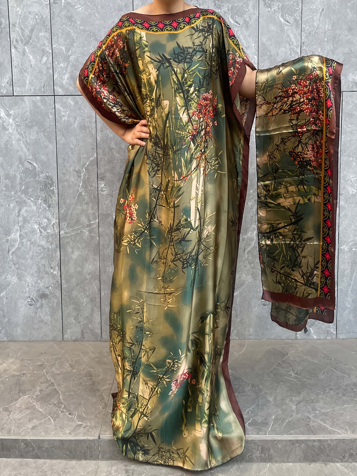 Stylish plus size maxi kaftan dress with crew neck and short sleeves made of comfortable polyester fabric. Loose fit with all-over print design, perfect for summer beach and outdoor events.